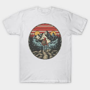 An intrepid explorer navigating a challenging mountain path T-Shirt